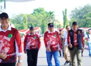 Panjat Pinang Semarak HUT ke-81 RI, Bupati Muba: Utamakan Keselamatan dan Kekompakan